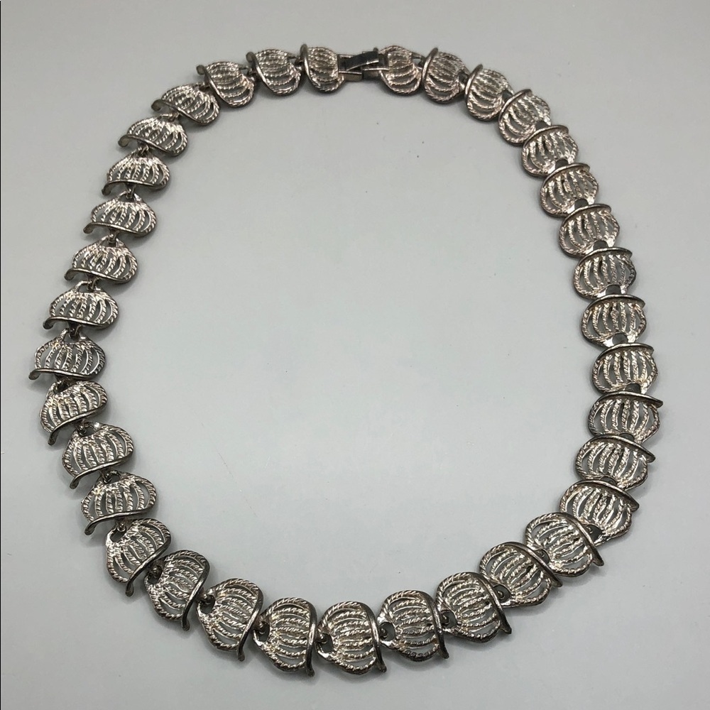 Vintage silver tone metal links collar necklace signed HJ costume jewelry.